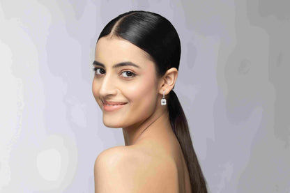 Octa 5.2 ct Solitaire Moissanite 925 Silver Drop Earrings showing intense signature rainbow fire.