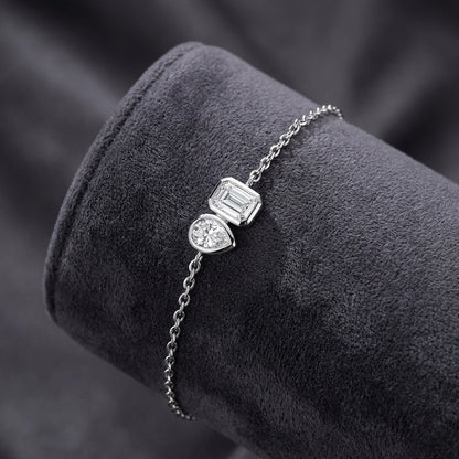 1.5ct Toi et Moi Moissanite Silver Bracelet - Emerald & Pear Bezel Set