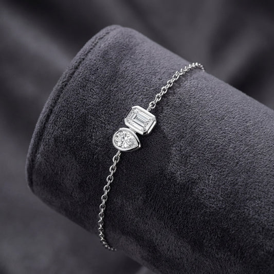 1.5ct Toi et Moi Moissanite Silver Bracelet - Emerald & Pear Bezel Set