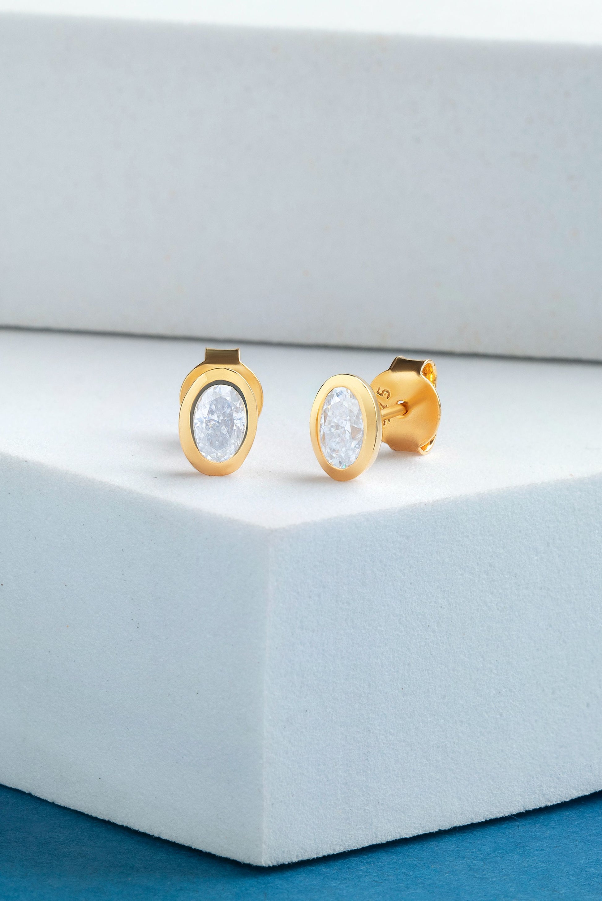 Elara 1.4 ct Oval Moissanite Bezel-Set 925 Silver Stud Earrings - Sleek minimalist style.