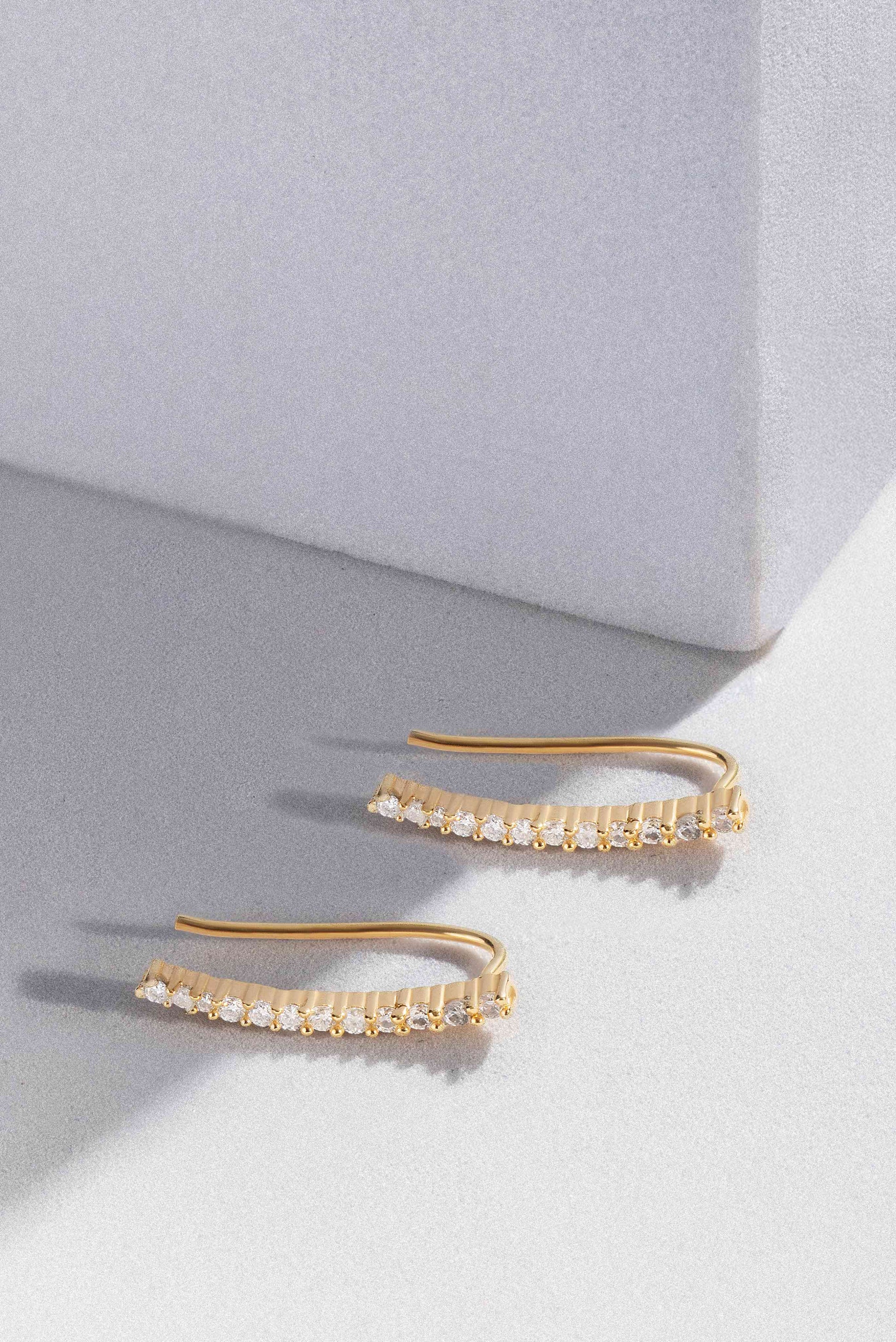 Glide 0.44 ct Round Moissanite Prong-Set 925 Silver Ear Climbers with signature rainbow fire.